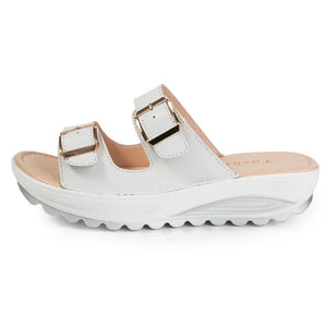 Sandaler med kilklack og dämpande sula