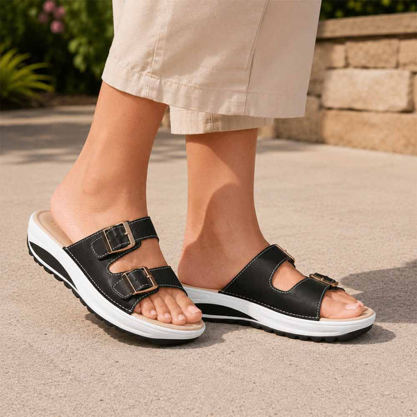 Sandaler med kilklack og dämpande sula